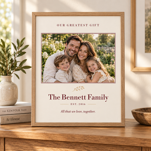 Our Greatest Gift personalized family photo print in a natural oak frame, with family name and year.